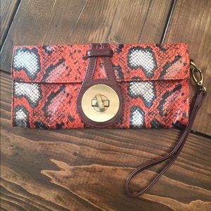 Orange snakeskin wristlet